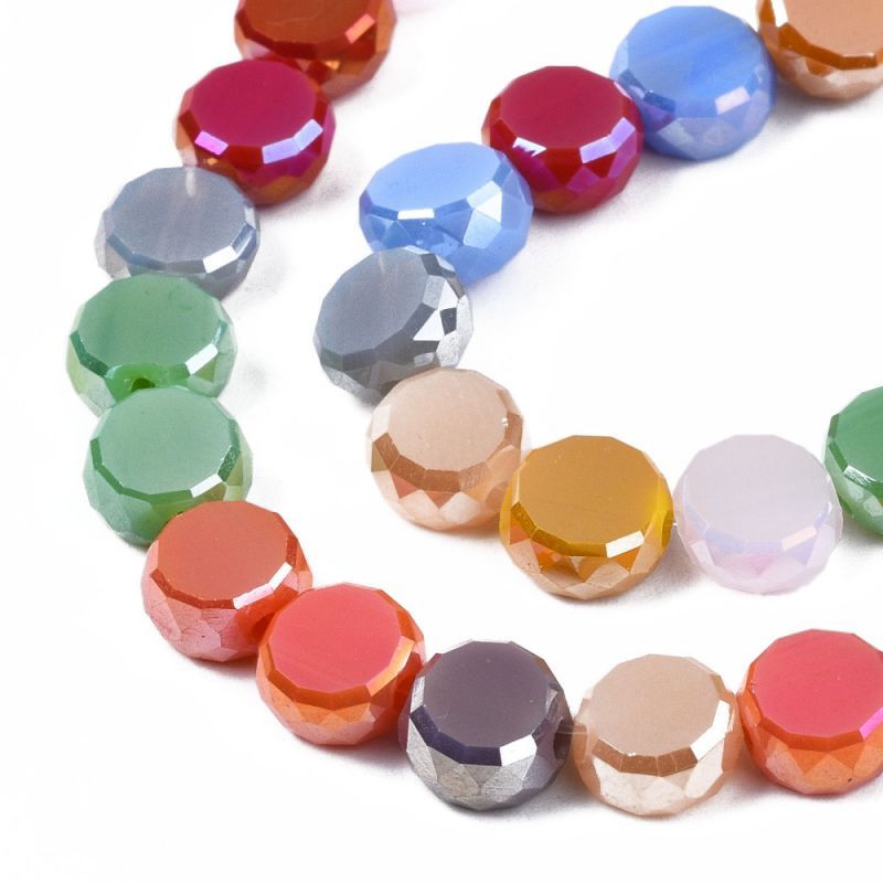 Mix Perles en verre à facettes lustrées. Couleurs assorties. 7.5x3.8mm fil de 50cm